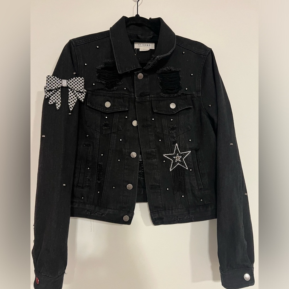 Embellished black denim jacket with studded bows